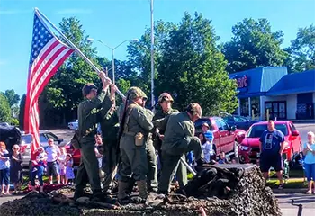 Ellen Leidy doing a reenactment in a parade